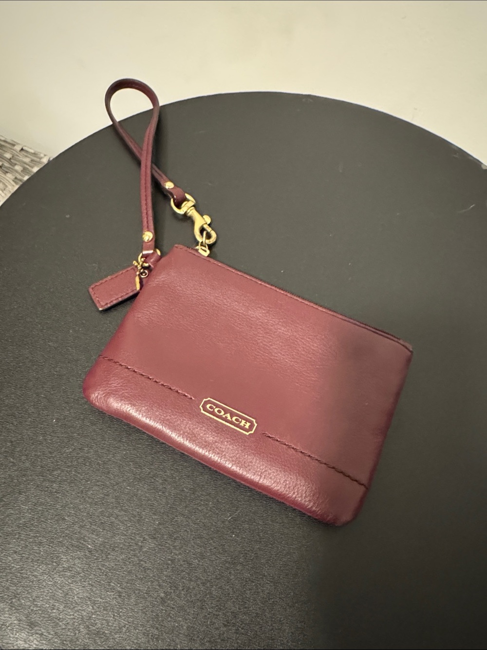 COACH Wine Leather Wristlet with Gold Hardware